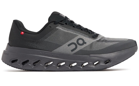 Cloudsurfer Next W running shoe in black and gray with distinctive sole design.