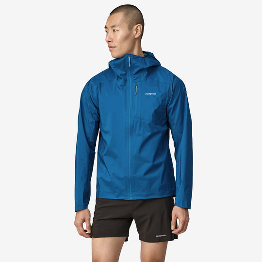 Men's blue lightweight waterproof jacket, packable into chest pocket, made from recycled materials.