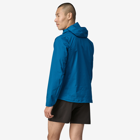 Men's blue lightweight, waterproof, breathable jacket with adjustable hood and semi-elastic cuffs, made from recycled materials.