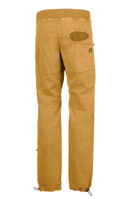 Urban climbing pants in organic cotton satin with contrasting printed fabric pockets and rear embroidery.